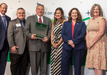 D158 administrators accept Green Ribbon Schools award from U.S. Department of Education